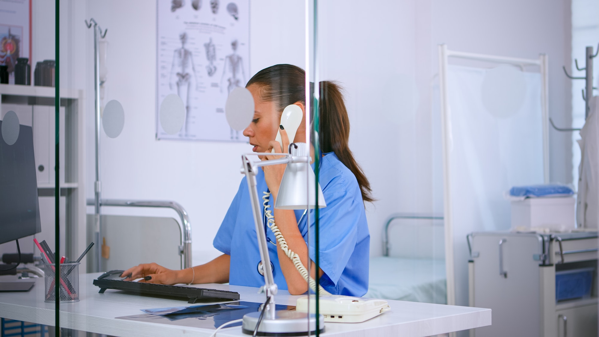 Healthcare physician answering phone calls